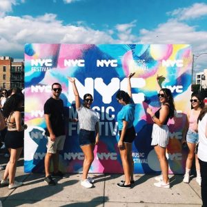 step and repeat banner at a NYC music festival